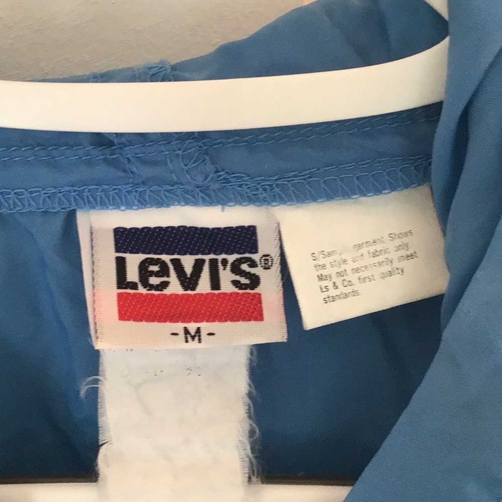 Y2K Vintage Levi's unisex light Blue Hooded  wind breaker .M